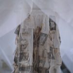 a garment with photos of black women printed on it