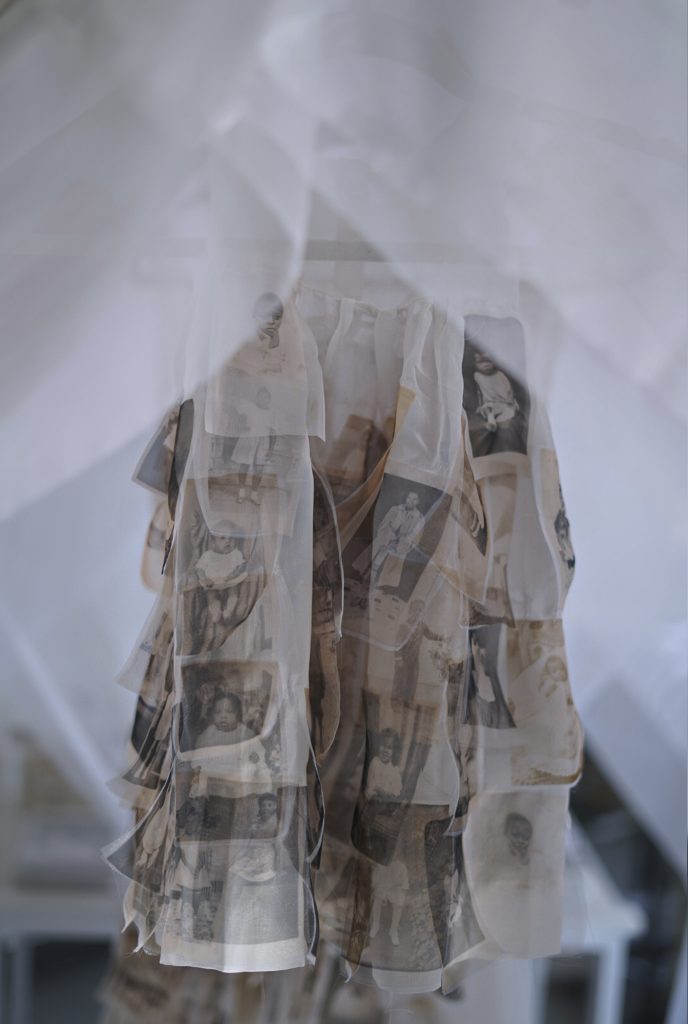 a garment with photos of black women printed on it