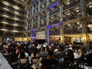 ITS 9.18.25 An audience is seated inside the George PEabody Library